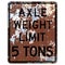 Old rusty American road sign - Axle Weight Limit 5 tons