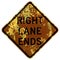 Old rusty American road sign - Lane ends shorthand