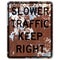 Old rusty American road sign - Slower traffic keep right