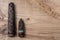 Old rusty artillery shell and aircraft projectile on wooden background, shells bullets of world war 2 found, digged out from the