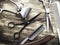 Old rusty barber shop tools on wood background