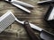 Old rusty barber shop tools on wood background