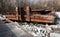 Old rusty barge on a river in the day