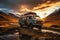 Old rusty blue camper parked on road in the mountains at sunset, summer travel concept