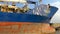 The old rusty blue and red icebreaker ship named Trader GH4 4K