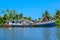 Old rusty boats on a shore of tropical sea. Cargo boat in water of island Ile-Sainte-Marie, Madagascar.