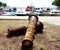 Old rusty bollard in the small port in fisherman`s village