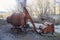 old rusty broken concrete mortar mixer with skip lift