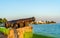 Old rusty cannon at the seaside promenade in Chetumal, Mexico