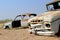 Old and rusty car wreck at the last gaz station before the Namib desert