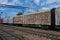 Old rusty cargo wagons on the railway station