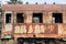 Old rusty cars standing in the abandoned depot