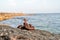 Old rusty chains and bitts of sea in the background