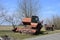 Old rusty disassembled combine harvester.Old Soviet combine