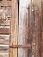 Old rusty door lock. Wooden door