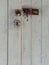 Old rusty door unlock with white wooden background