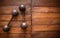 Old rusty dumbbells on wood background texture