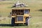 An old rusty earthmoving truck in a green field in regional Australia