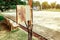 Old rusty electrical power control box on rusted electric pole