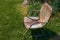 Old and rusty empty chair, death loss and grief metaphor