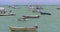 Old rusty fishing boats in Mancora, Peru with clear waters