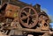 Old rusty gas engine and flywheel