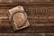 Old rusty horseshoe and book on wooden background