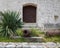 Old rusty iron cannons lying in front of the tower in the city of Cres