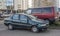 Old rusty Italian sedan car Fiat Siena abandoned on street