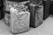 Old rusty jerrycans close-up, black and white