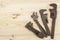 Old rusty mechanics tools on a wooden background. Advertising for new tools. Sales tools