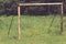 Old rusty metal gates on an abandoned soccer field