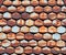 Old rusty metal hex tiles - weathered shingle roof closeup pattern