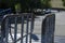 Old rusty metal turnstiles outdoors