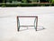 Old and rusty mini soccer football goal