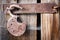 Old rusty padlock and spiderweb on wooden background, old mystery of the past