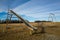 Old and rusty playground equipment sitting in the prairies of Alberta, Canada