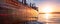 Old rusty ship in the Port during a vibrant sunset. Vancouver, British Columbia, Canada