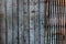 Old rusty sliding steel shutter door, grunge metal texture