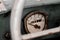 Old rusty speedometer and odometer on a car