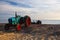 Old rusty tractor on the empty Cromer beach, Great Britain