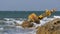 Old Rusty Yellow Buoy Lies on the Shore of a Rocky Beach. Thailand. Pattaya. Asia