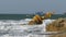 Old Rusty Yellow Buoy Lies on the Shore of a Rocky Beach. Thailand. Pattaya. Asia