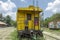 Old rusy railway yellow carriage