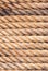 Old sailboat rope background texture. Portrait version