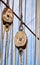 Old sailing ship wooden pulleys.