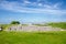 Old Saram With Green Grass And Blue Sky