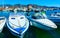 Old Sardinian Marina with ships in Mediterranean Sea in Villasimius reflex