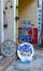 Old scales, metal dish and Turkish amulets at the entrance to the souvenir shop