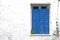 Old scrap blue wooden window shutter